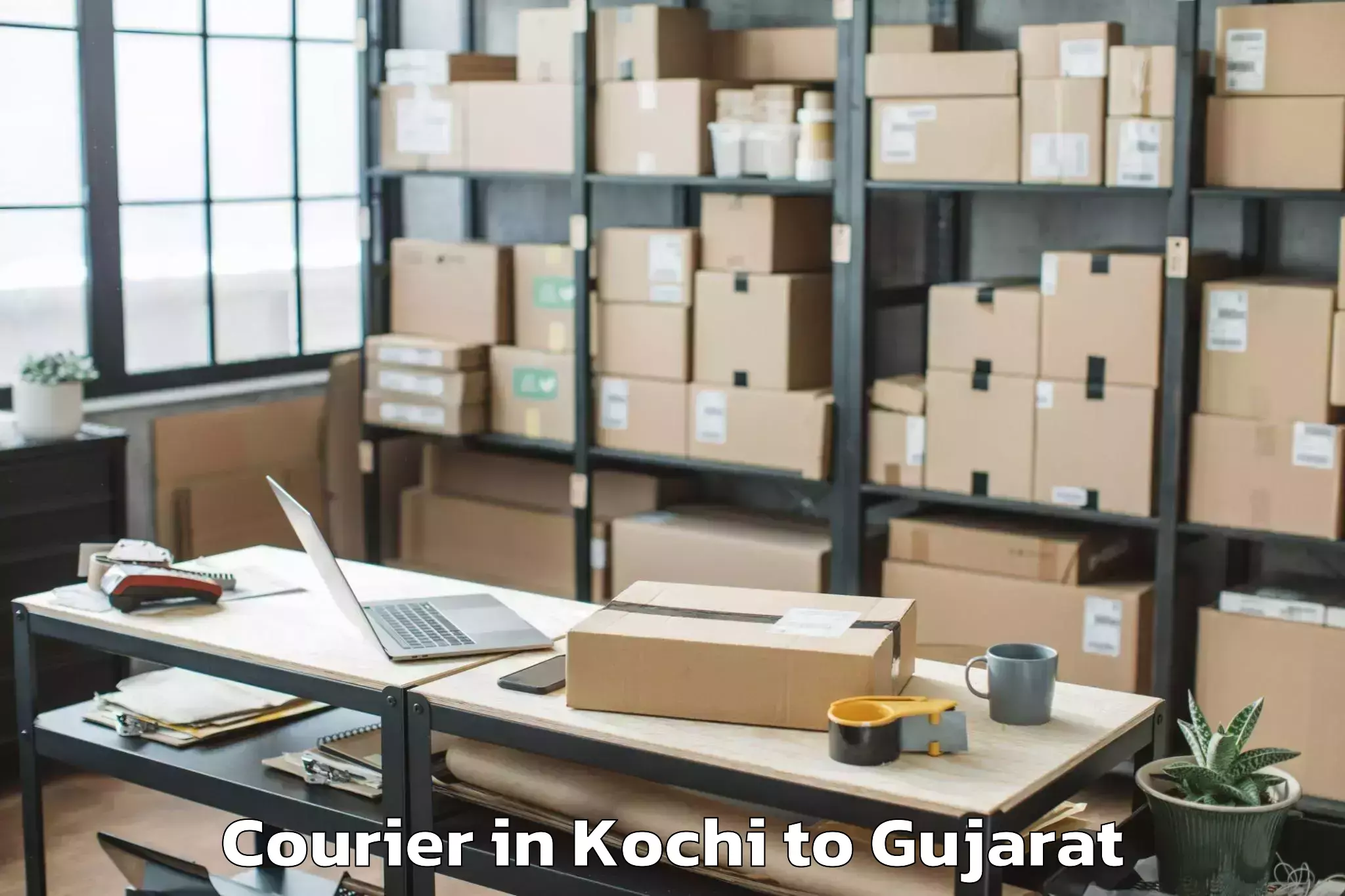 Professional Kochi to Keshod Airport Ixk Courier